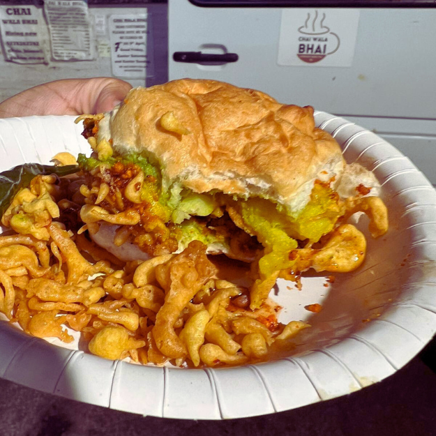 Half bitten closeup shot of Mumbai Vada Pav